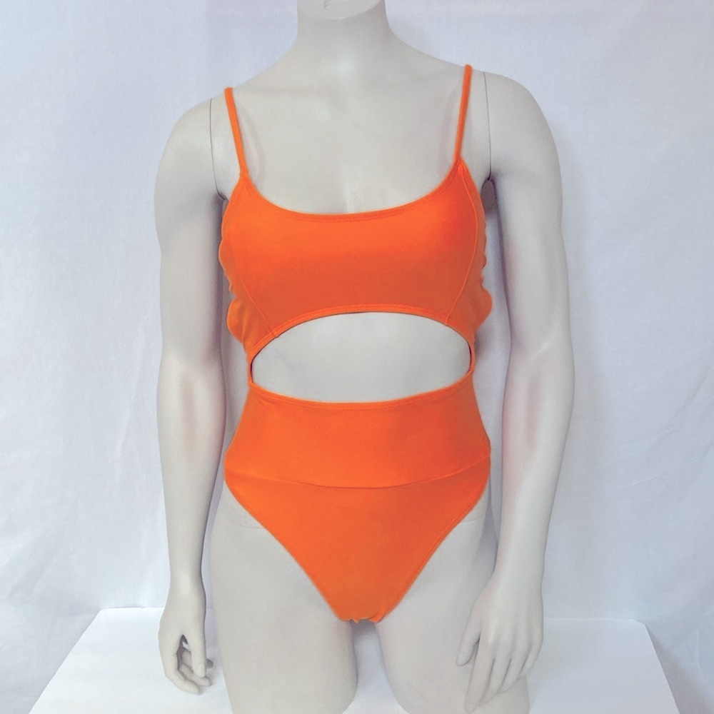 Vibrant Orange Cutout Swimsuit.  
One Piece Size Medium Padded Adjustable Straps
